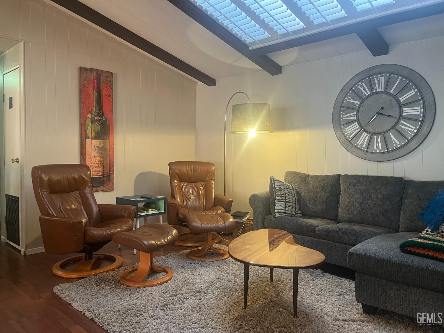 Undisclosed Address Santa Maria, CA 93454 - Photo 17 of 43 a living room with furniture a rug and a chair