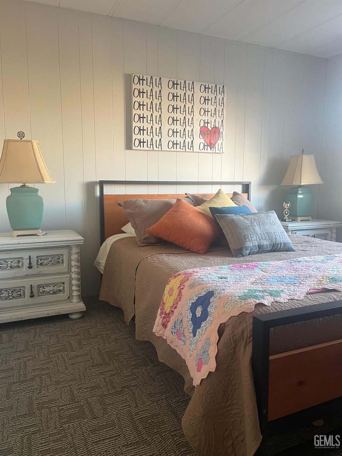 Undisclosed Address Santa Maria, CA 93454 - Photo 19 of 43 a bedroom with a bed and a night stand