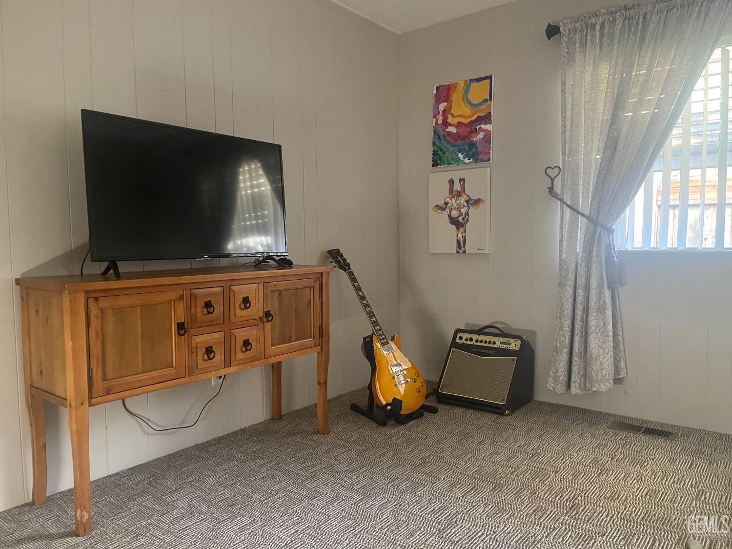 Undisclosed Address Santa Maria, CA 93454 - Photo 26 of 43 a room with furniture and flat screen tv