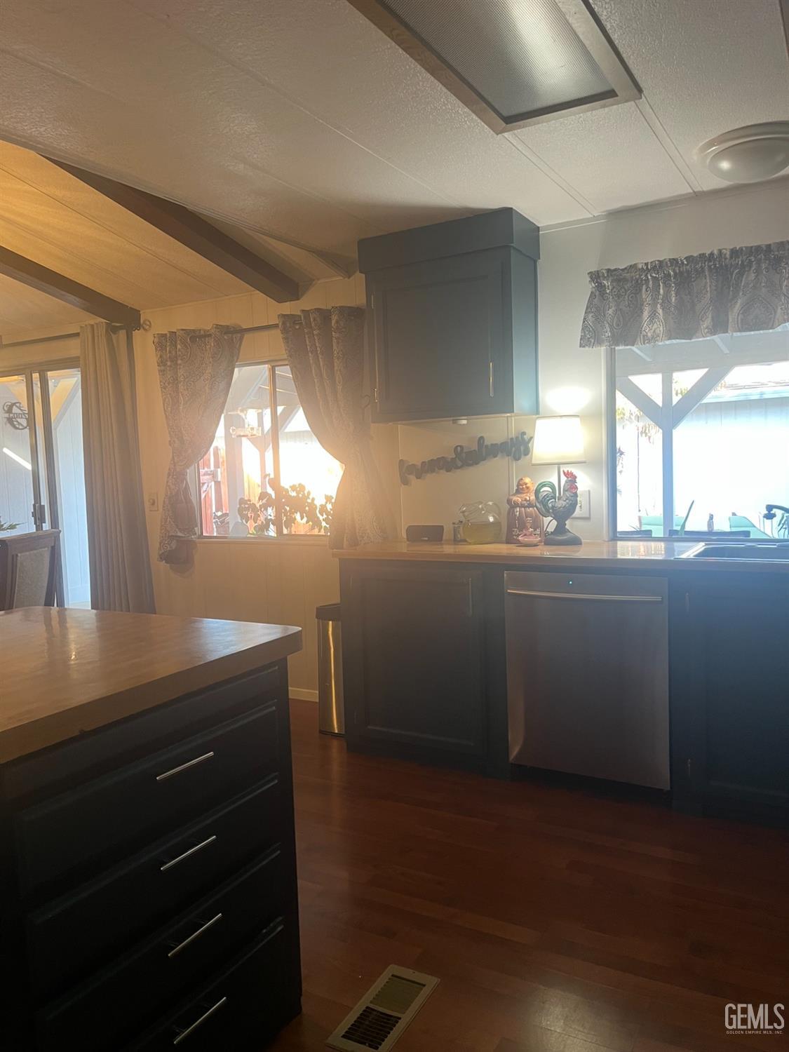 Undisclosed Address Santa Maria, CA 93454 - Photo 35 of 43 a kitchen with a sink and cabinets