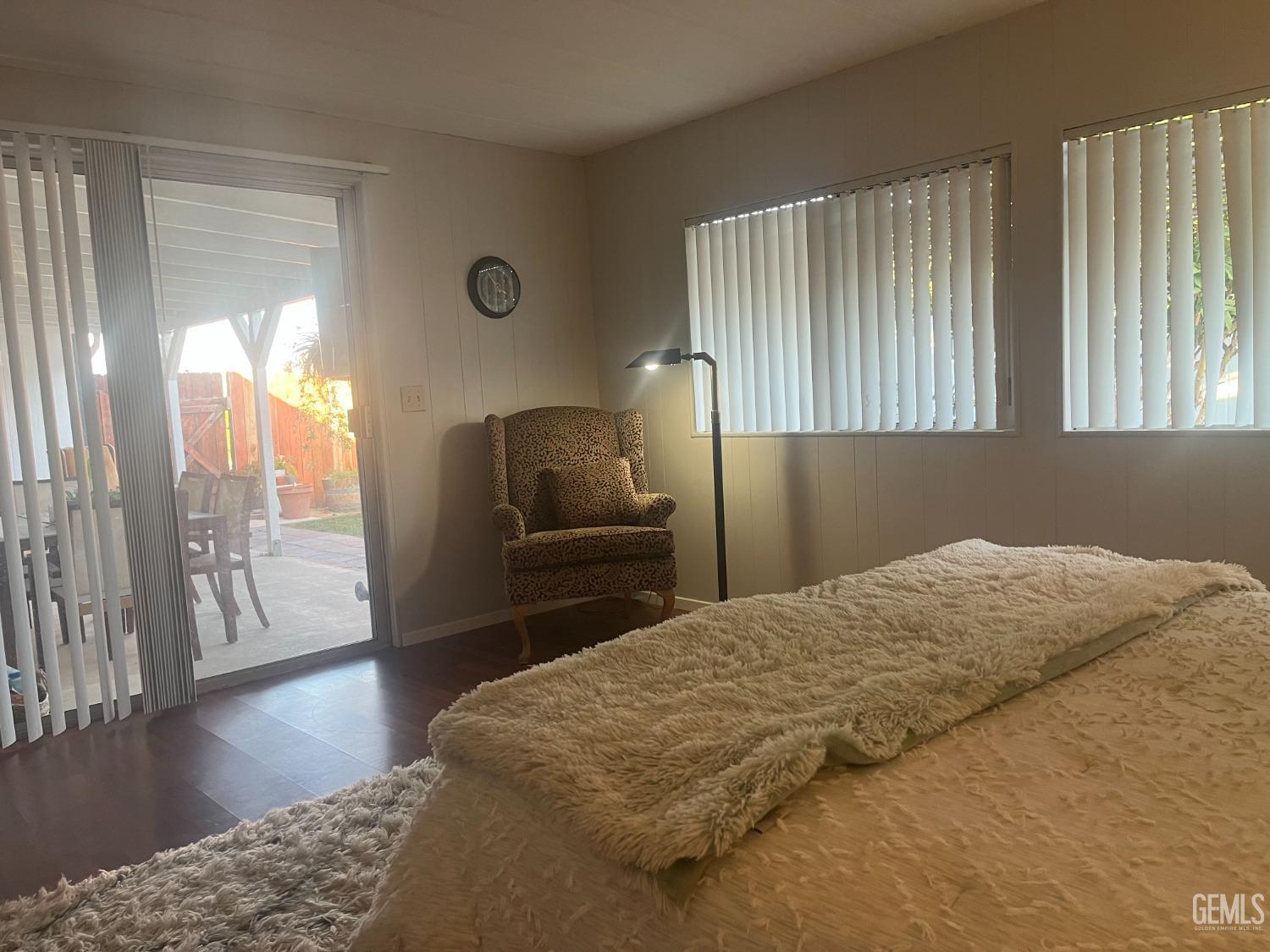 Undisclosed Address Santa Maria, CA 93454 - Photo 38 of 43 a bedroom with a bed and wooden floor