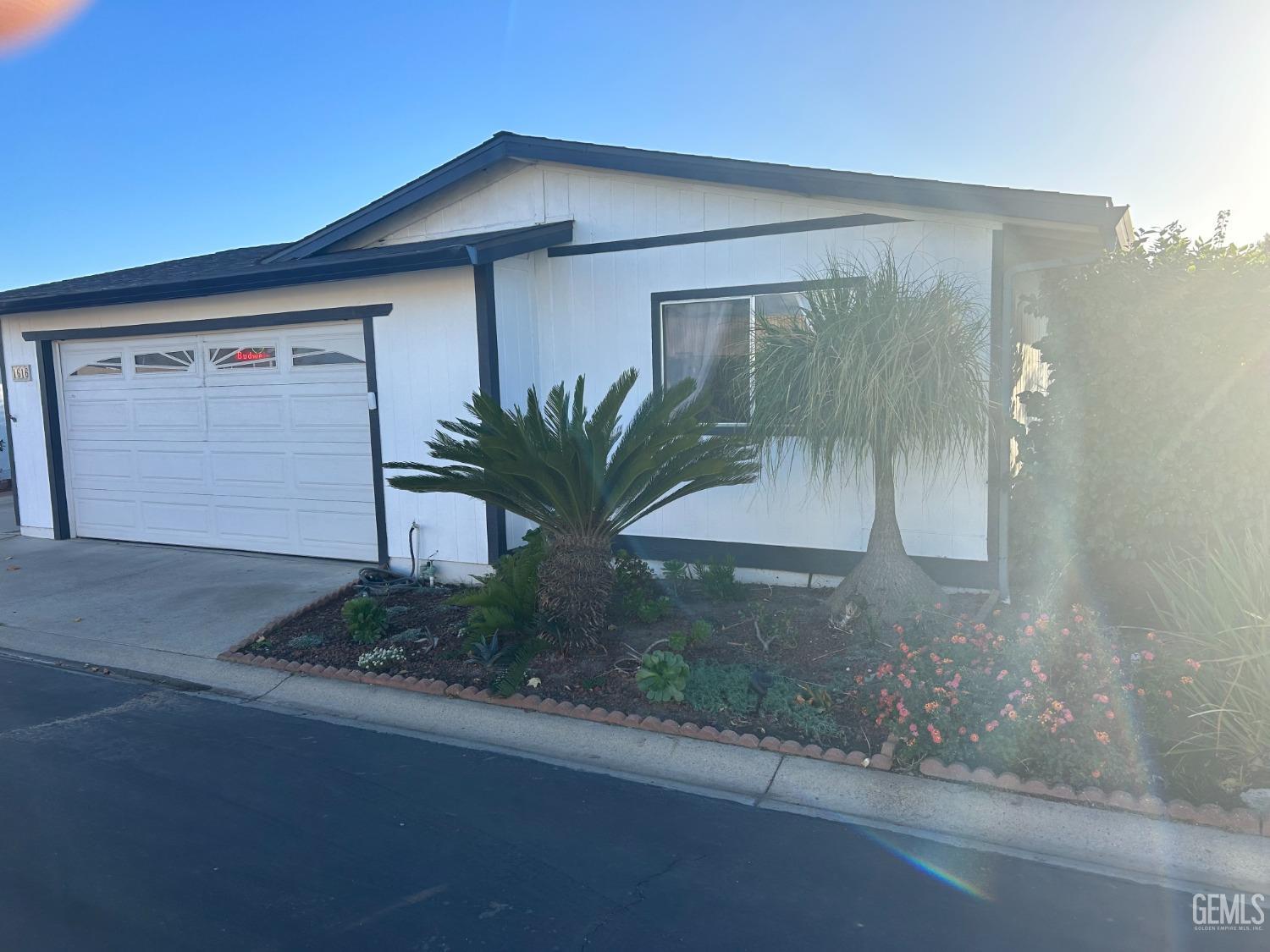 Undisclosed Address Santa Maria, CA 93454 - Photo 7 of 43 a front view of a house with garden