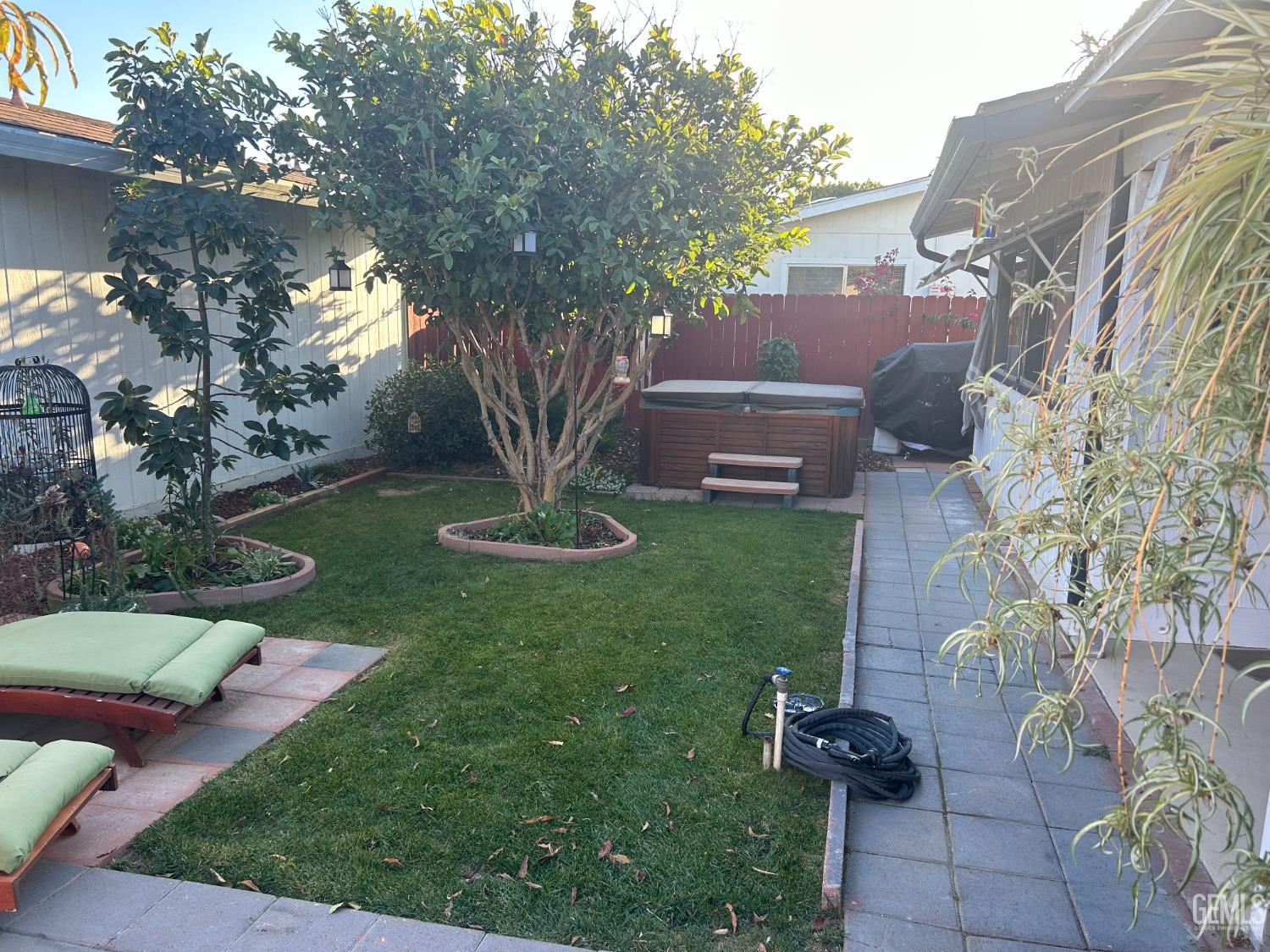 Undisclosed Address Santa Maria, CA 93454 - Photo 8 of 43 a front view of a house with garden