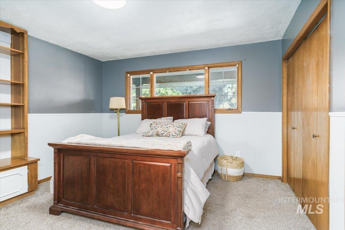 1401 Chokecherry Drive Pocatello, ID 83204 - Photo 21 of 46 Wall-to-wall carpeting with a light neutral tone