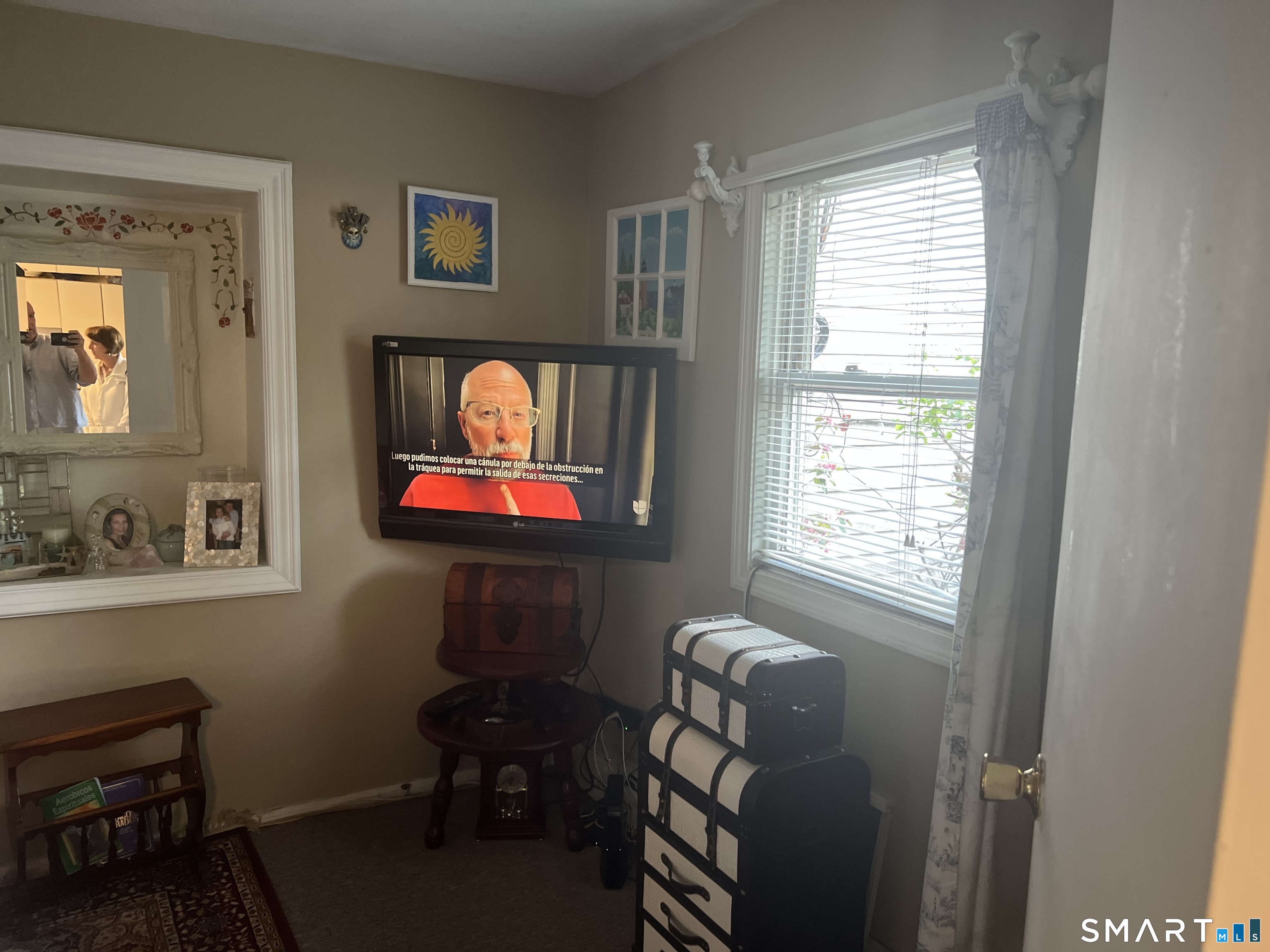 275 Long Ridge Road Stamford, CT 06905 - Photo 24 of 40 a living room with furniture and a window
