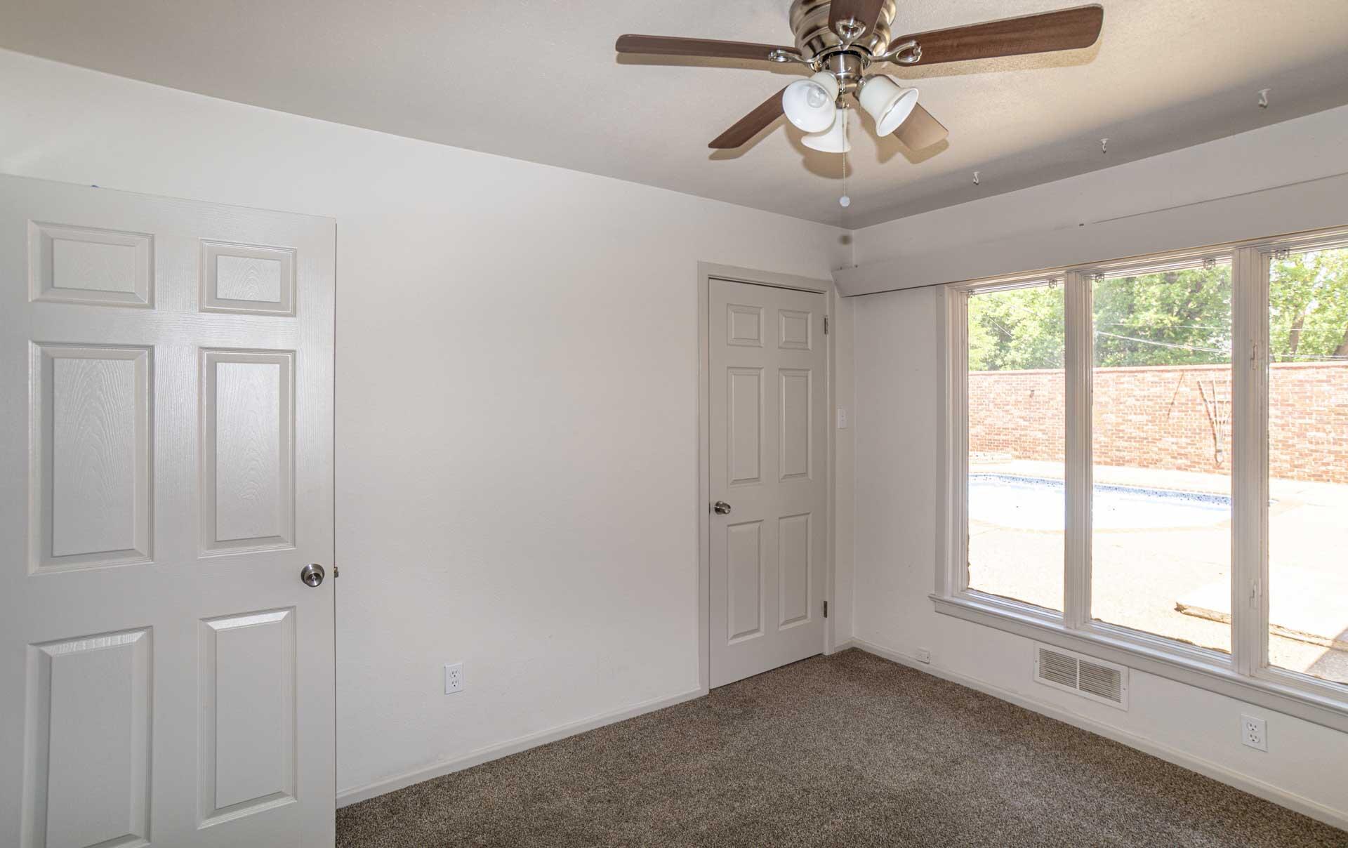 2136 57th Street Lubbock, TX 79412 - Photo 28 of 41 a view of an empty room with a window