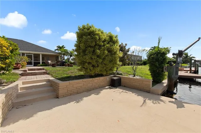 a view of a garden with an outdoor space