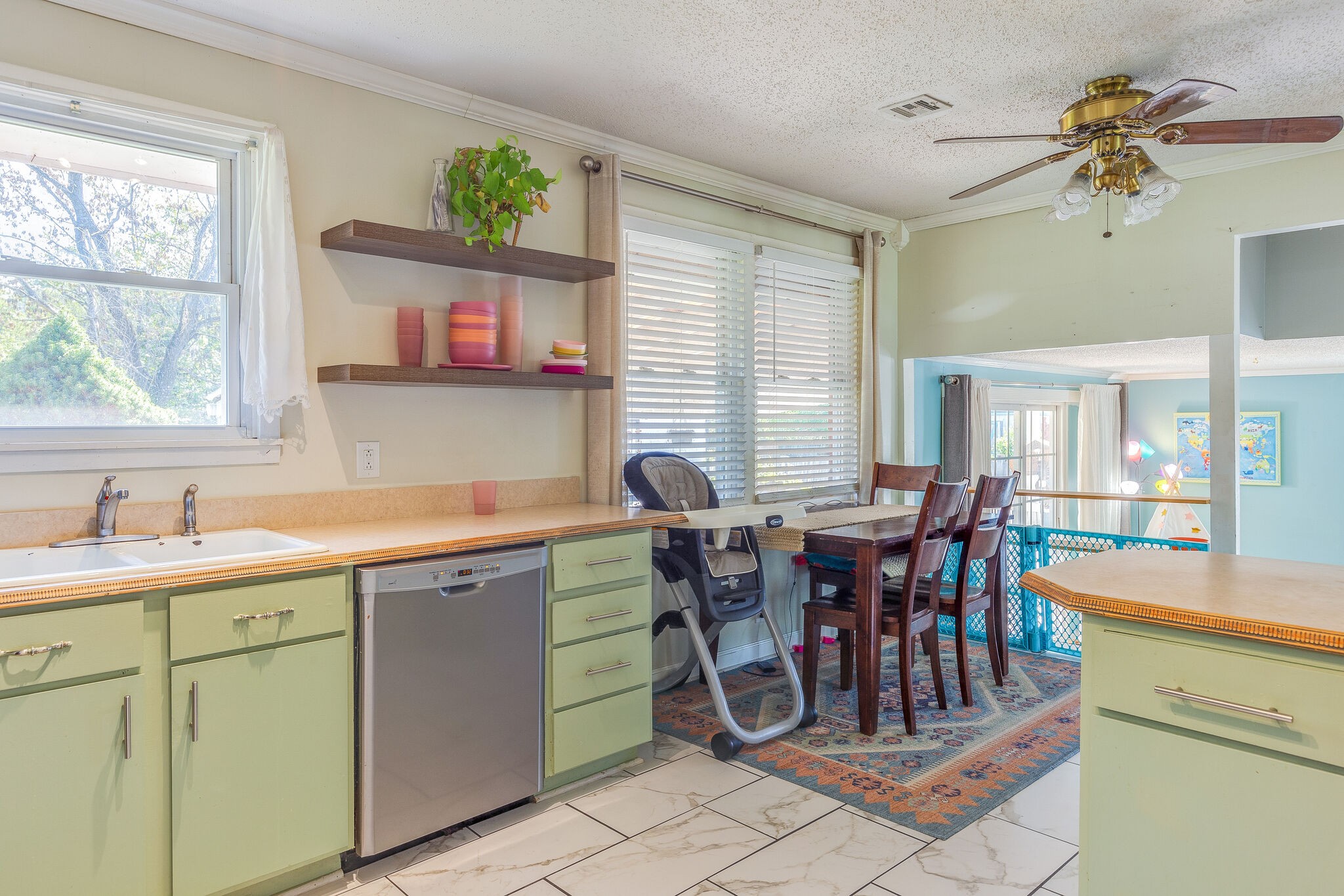 480 Rural Hill Road Nashville, TN 37217 - Photo 11 of 25 a kitchen with a dining table chairs and large window