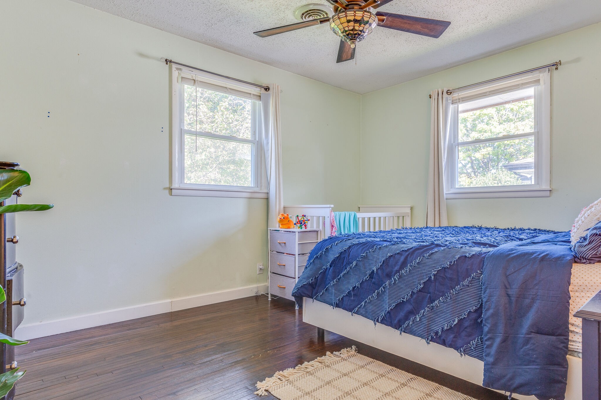 480 Rural Hill Road Nashville, TN 37217 - Photo 17 of 25 a bed sitting in a bedroom next to a window