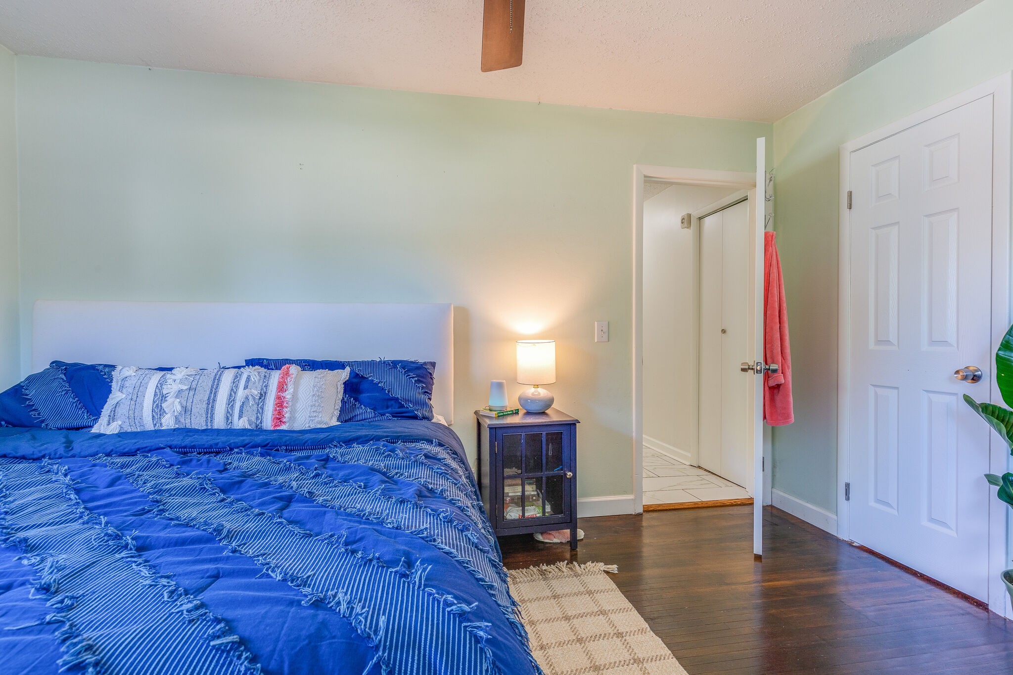 480 Rural Hill Road Nashville, TN 37217 - Photo 18 of 25 a spacious bedroom with a bed and wooden floor
