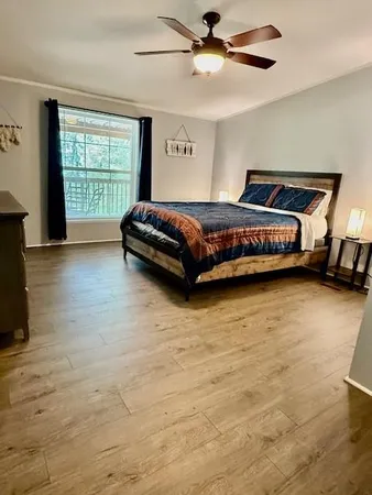 wooden floor in a hall with an entryway