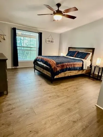 wooden floor in a hall with an entryway