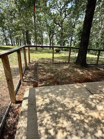 a view of backyard with green space