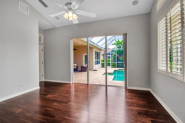 a view of an entryway with wooden floor