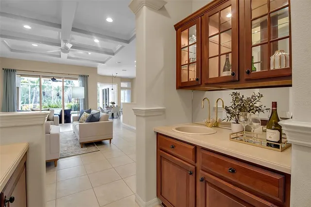 a view of living room with granite countertop furniture and a large window