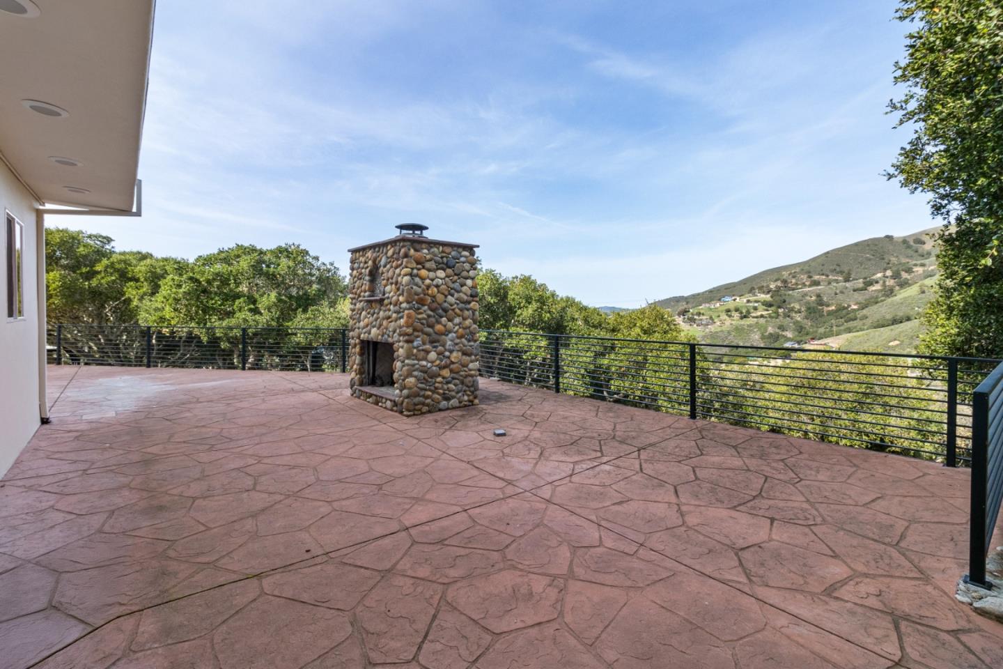 320 El Caminito Road Carmel Valley, CA 93924 - Photo 47 of 62 a view of a road with a building in the background