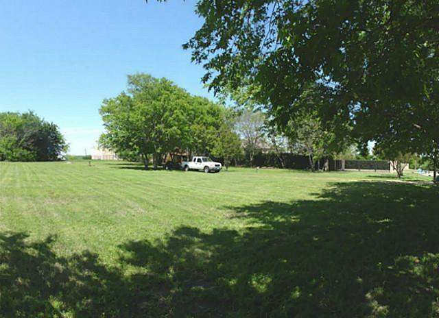 111 Barnes Bridge Road Sunnyvale, TX 75182 - Photo 6 of 17 a view of green field with trees in the background