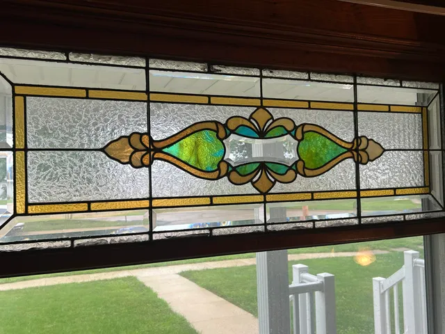 a view of a swimming pool with a lounge chair