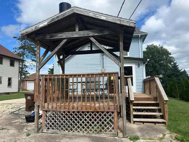 a front view of a house with a glass door
