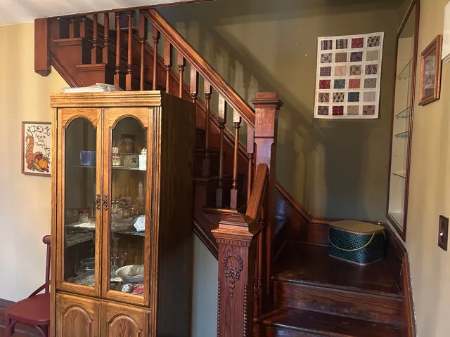 a view of an entryway with a kitchen