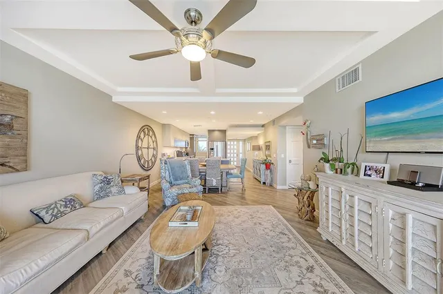 a large kitchen with a table and chairs