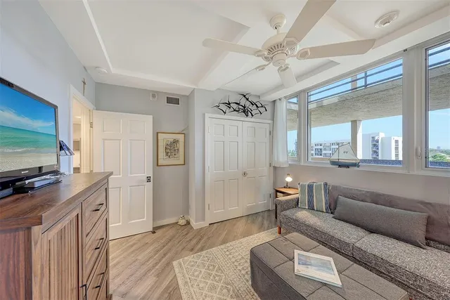 a outdoor room with chairs