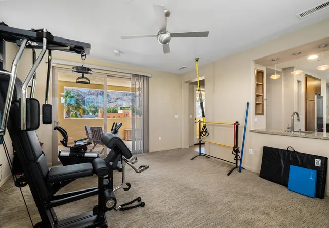 a view of a room with gym equipment