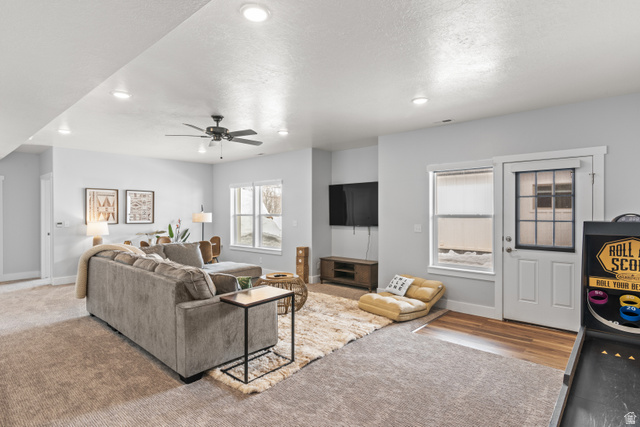 1343 North Trapper Loop Garden City, UT 84028 - Photo 28 of 56 Living room with recessed lighting, a ceiling fan, carpet floors, and a textured ceiling