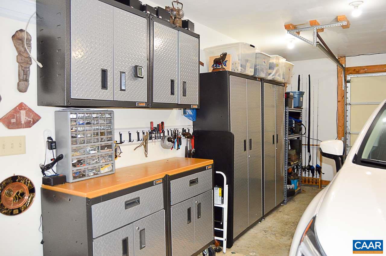 6688 Amicus Road Ruckersville, VA 22968 - Photo 31 of 43 a kitchen with stainless steel appliances granite countertop a refrigerator and a sink