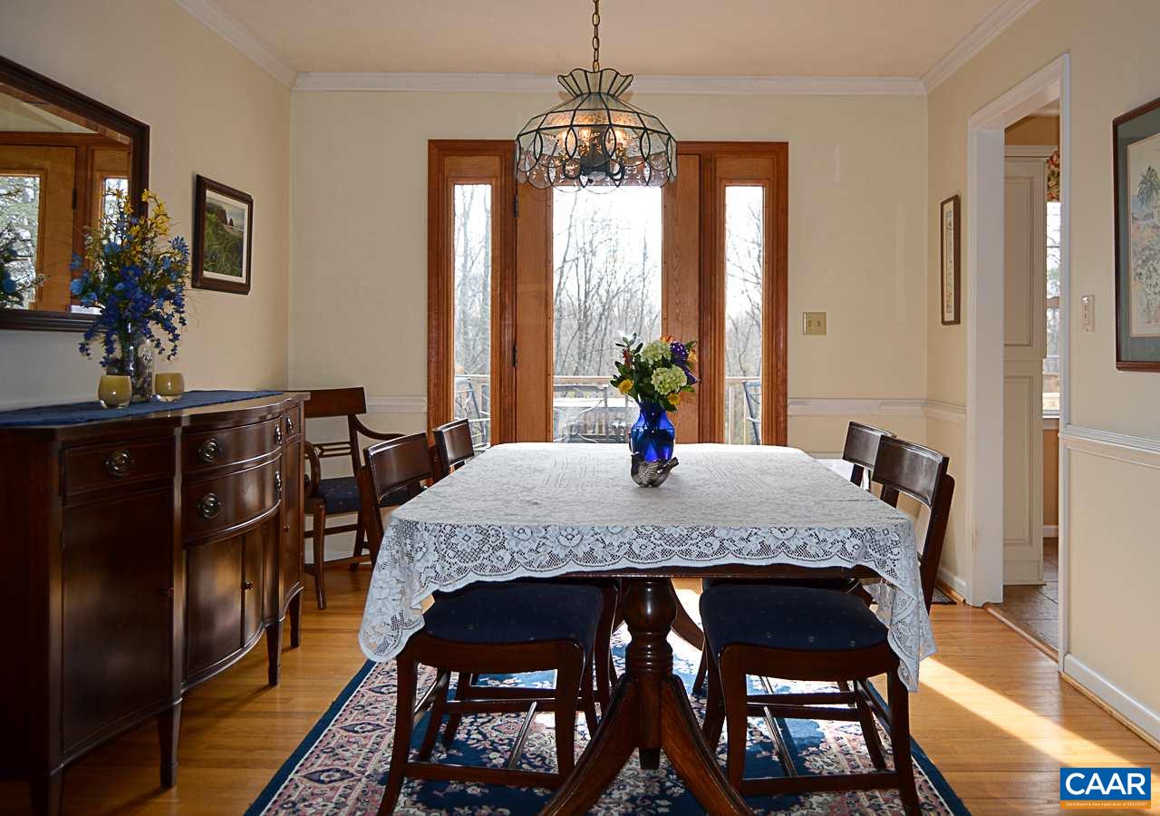 6688 Amicus Road Ruckersville, VA 22968 - Photo 9 of 43 a view of a dining room with furniture and window