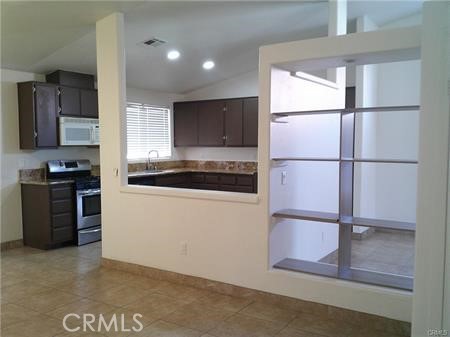 68380 Risueno Road Cathedral City, CA 92234 - Photo 9 of 25 Family Room to Kitchen