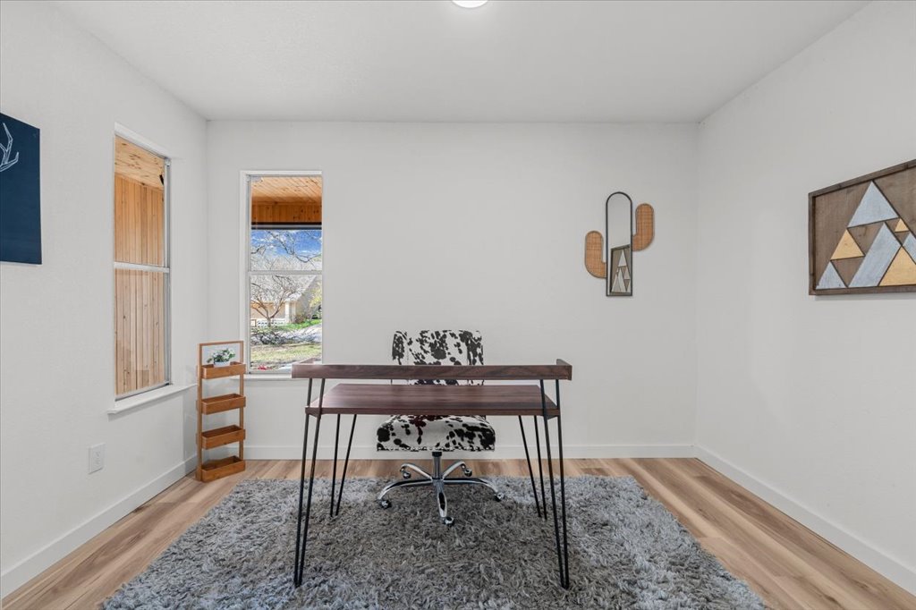 9223 Independence Loop Austin, TX 78748 - Photo 11 of 37 a view of a workspace with furniture