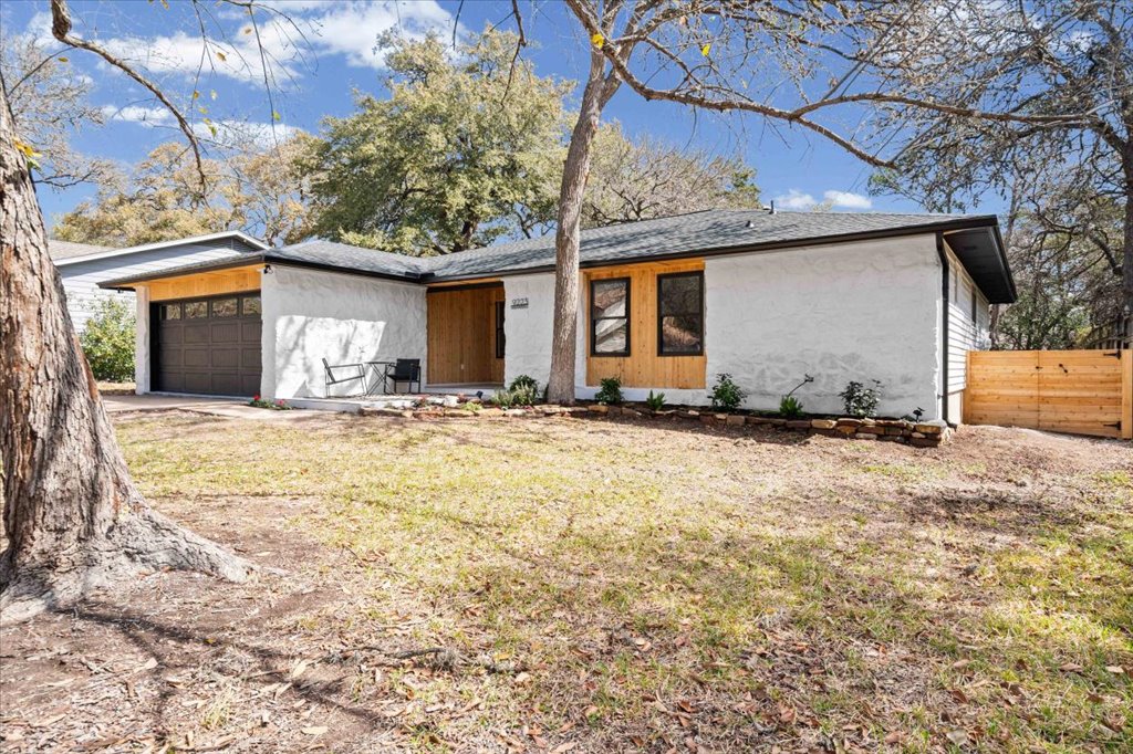 9223 Independence Loop Austin, TX 78748 - Photo 3 of 37 a view of a house with a yard