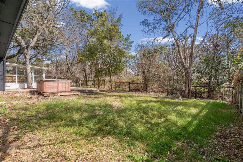 9223 Independence Loop Austin, TX 78748 - Photo 31 of 37 a backyard of house with a garden and entertaining space