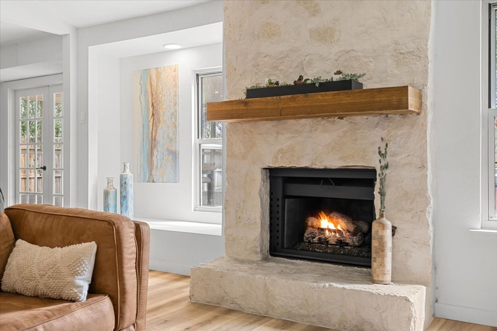 9223 Independence Loop Austin, TX 78748 - Photo 8 of 37 a living room with furniture and a fireplace