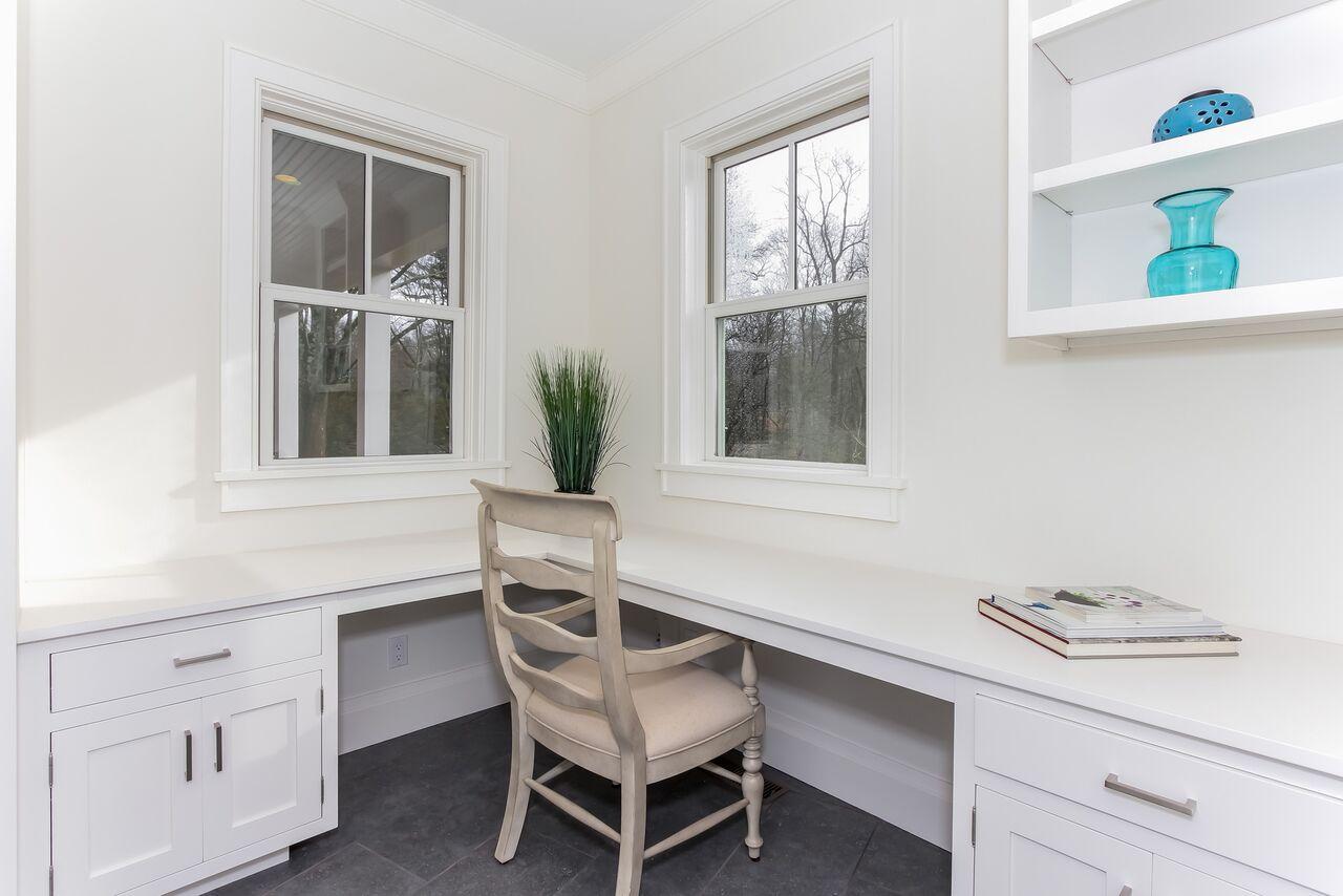 7 Indian Spring Road Rowayton, CT 06853 - Photo 17 of 28 a white house with a sink and a window