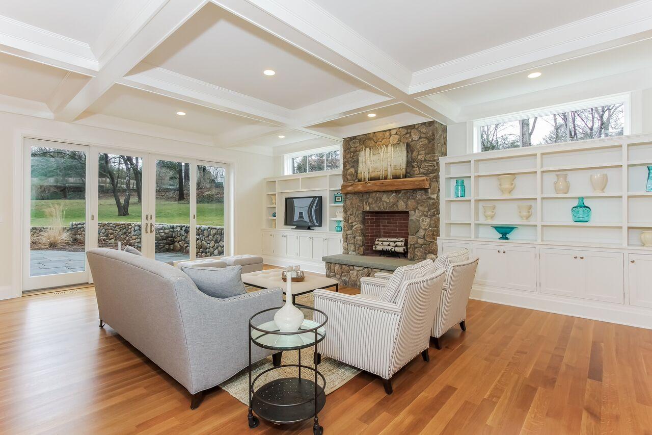 7 Indian Spring Road Rowayton, CT 06853 - Photo 9 of 28 a living room with furniture and a fireplace