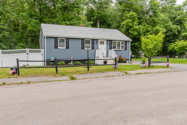 22 Roseen Road Holbrook, MA 02343 - Photo 1 of 30 a view of a house with a yard and sitting area