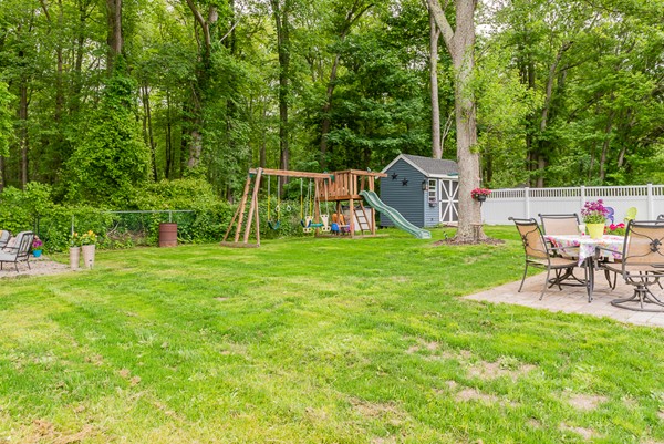 22 Roseen Road Holbrook, MA 02343 - Photo 3 of 30 a view of a table and chairs in the garden