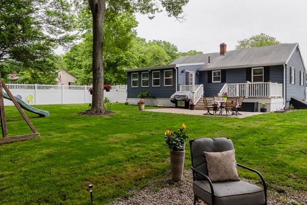 22 Roseen Road Holbrook, MA 02343 - Photo 4 of 30 a front view of a house with garden and porch