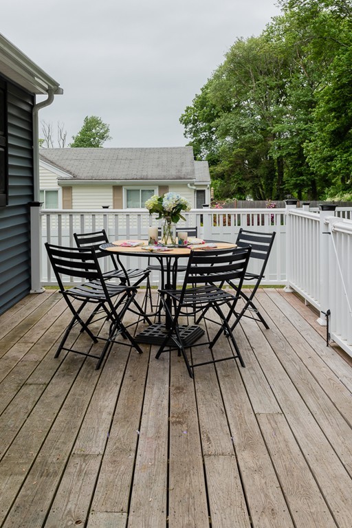 22 Roseen Road Holbrook, MA 02343 - Photo 7 of 30 a view of a roof deck with table and chairs