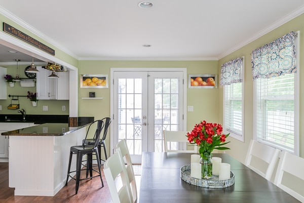 22 Roseen Road Holbrook, MA 02343 - Photo 9 of 30 a view of a dining room with furniture and a potted plant
