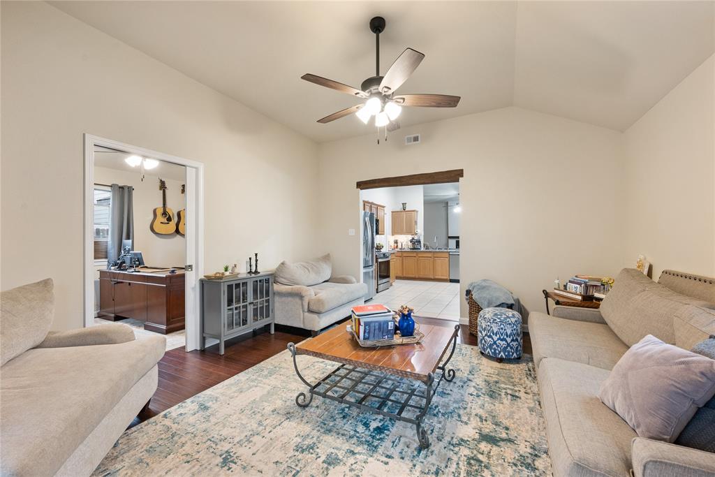 8613 King Ranch Drive Cross Roads, TX 76227 - Photo 11 of 25 a living room with furniture and wooden floor