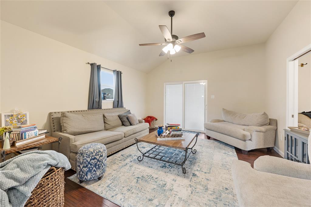8613 King Ranch Drive Cross Roads, TX 76227 - Photo 10 of 25 a living room with furniture and a couch