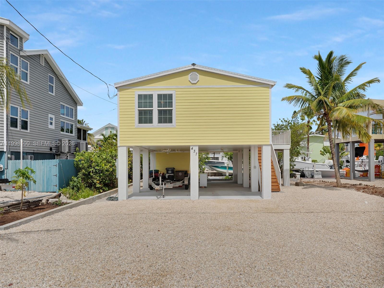437 Pirates Road Summerland Key, FL 33042 - Photo 37 of 39 a view of a house with a street