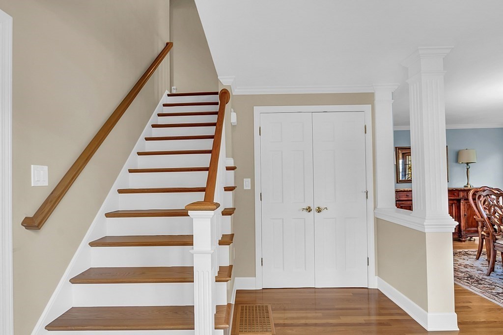 27 Sable Run Lane Methuen, MA 01844 - Photo 19 of 42 a view of front door with wooden floor and stairs