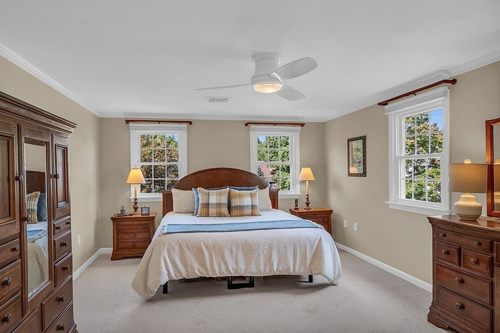 27 Sable Run Lane Methuen, MA 01844 - Photo 20 of 42 a bedroom with a large bed and a window