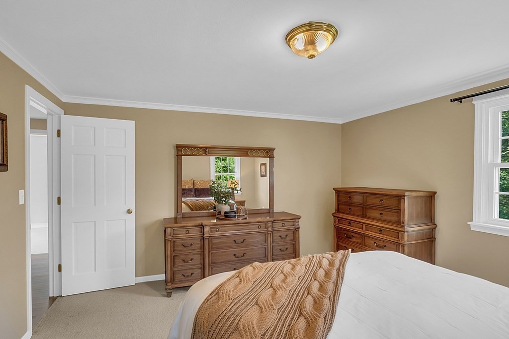27 Sable Run Lane Methuen, MA 01844 - Photo 26 of 42 a bedroom with a bed and a dresser