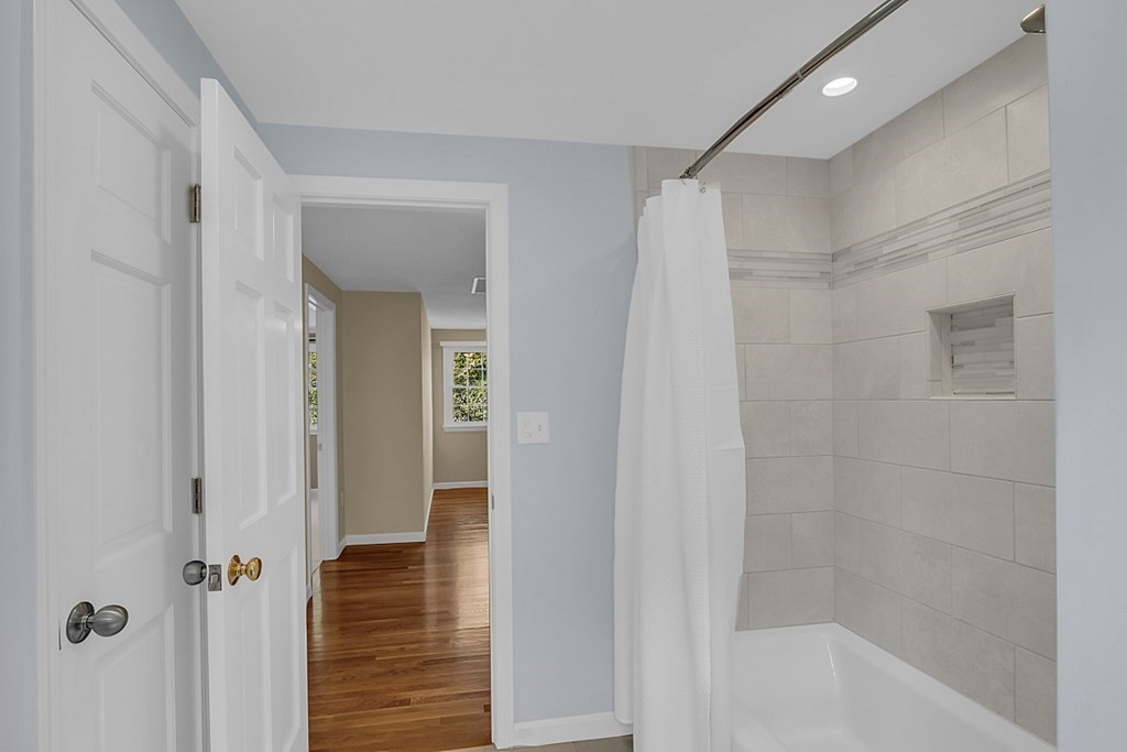 27 Sable Run Lane Methuen, MA 01844 - Photo 29 of 42 a bathroom with a shower and a glass door