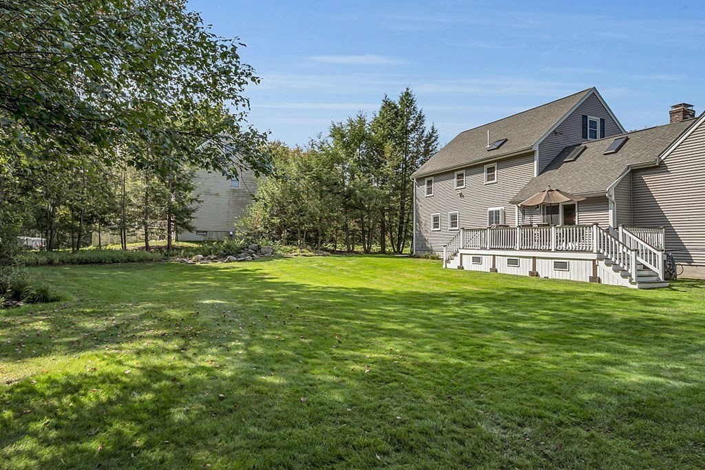 27 Sable Run Lane Methuen, MA 01844 - Photo 41 of 42 a view of a house with a big yard and large trees